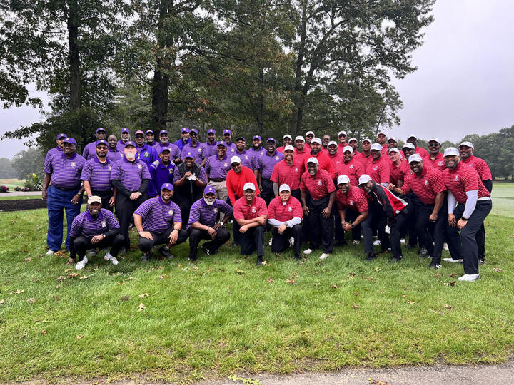 Both teams together on the course
